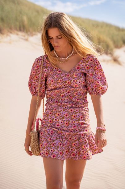 Green top with lilac floral print