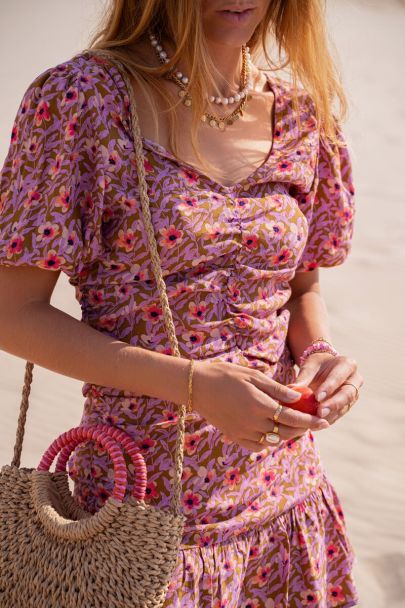 Green top with lilac floral print