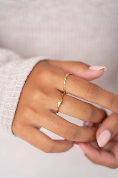 Ring with small star