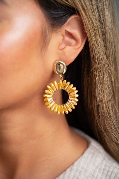 Beige round statement earrings