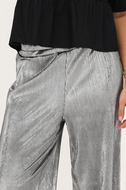 Silver coloured pleated trousers