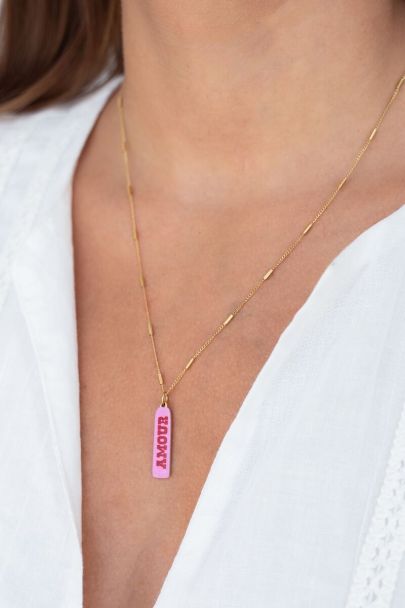Art necklace with pink amour charm