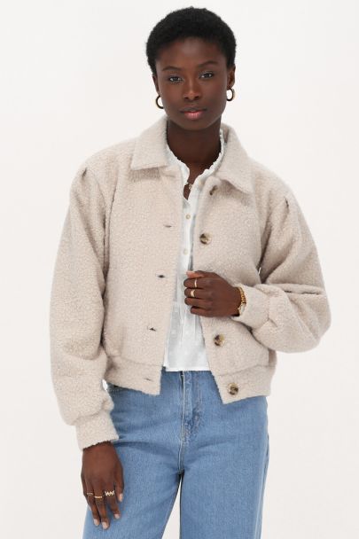 Beigefarbene Bouclé-Jacke