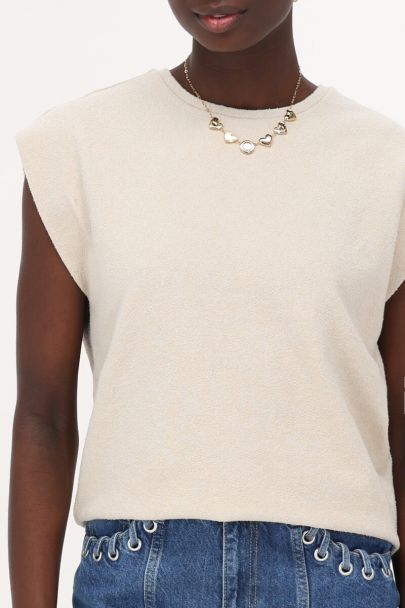 Beige textured sleeveless T-shirt