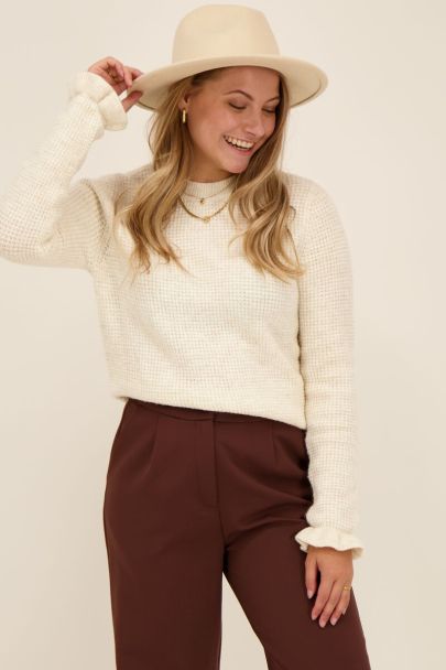 Beige sweater with ruffle detail