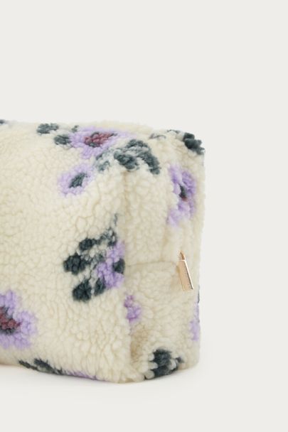Beigefarbene Teddy-Kulturtasche mit lila Blumen
