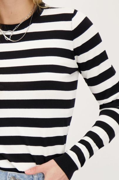 Black and white striped top with long sleeves