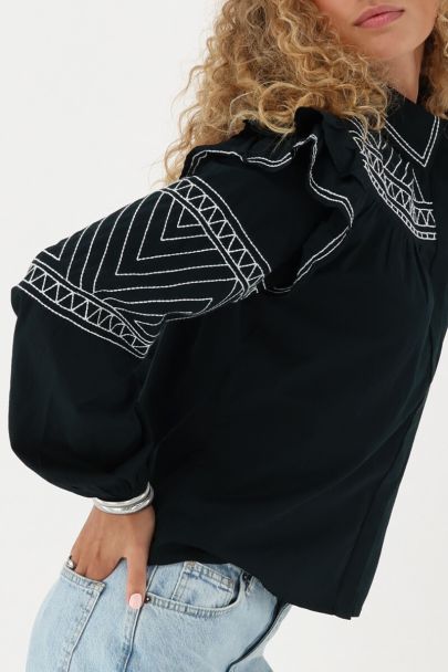 Black blouse with ruffle and embroidery 