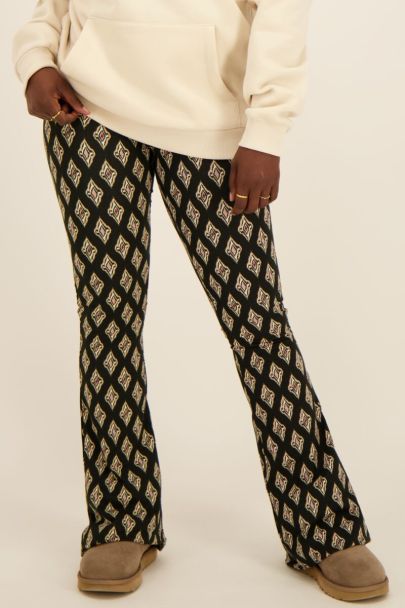 Pantalon flare noir à imprimé géométrique