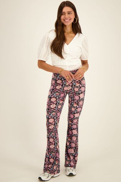 Black flared pants with purple floral print