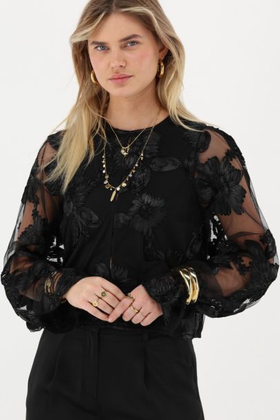 Top en mesh noir à fleurs avec manchettes