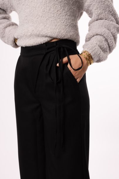 Pantalon noir portefeuille