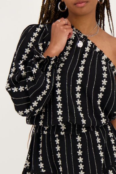 Black and white one-shoulder top with embroidery