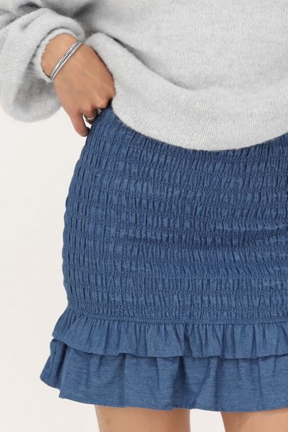 Blauwe denim rok met smock