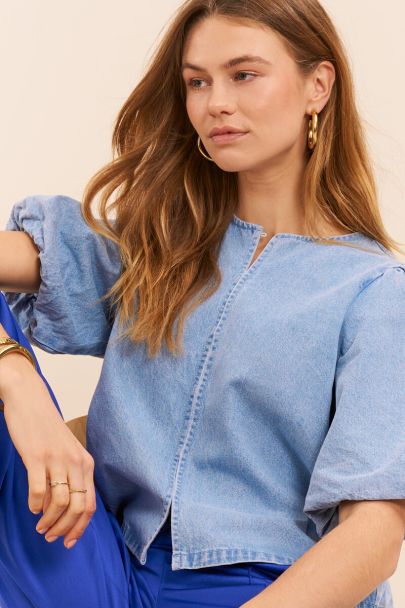 Blauwe denim top met pofmouwen