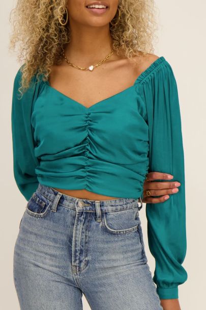 Blue satin-look top with pleats