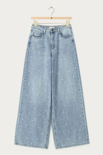 Jean large bleu avec perles fantaisie et strass