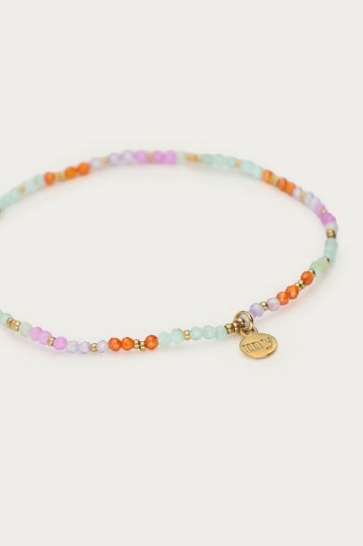 Botanical bracelet with blue beads