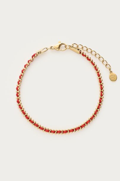 Bracelet avec chaîne à billes et cordon rouge