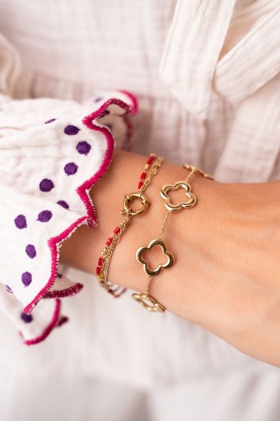 Triple bracelet with red beads