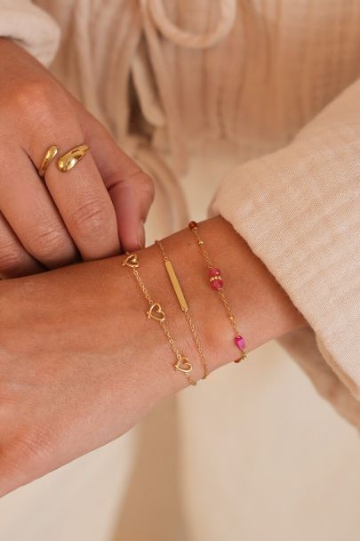 Bracelet with polka dots & pink beads