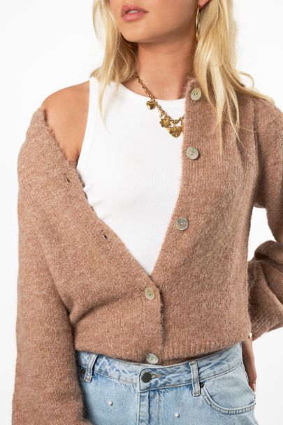 Cardigan beige avec boutons et manches bouffantes