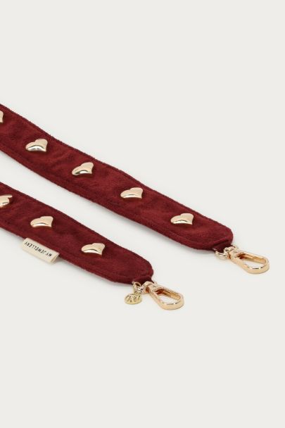 Burgundy telefoonkoord in suede look met hartjes studs