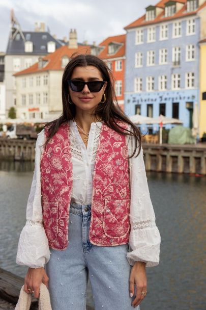 Pink padded gilet with flowers