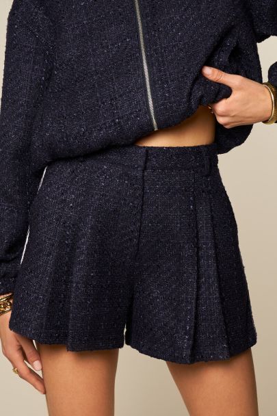 Dark blue bouclé shorts with side stripes