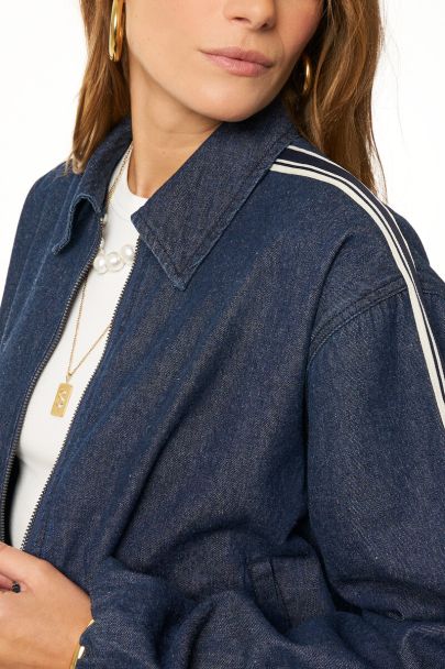 Dark blue denim jacket in sporty look 