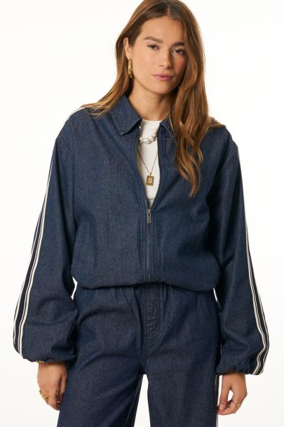 Dark blue denim jacket in sporty look 