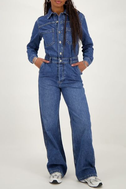 Dark blue denim jumpsuit with long sleeves