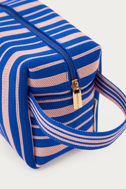 Dark blue toiletry bag with pink stripes