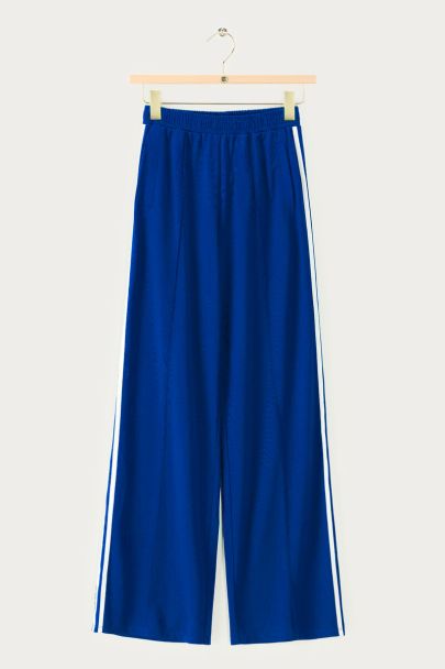 Dunkelblaue weite Jogginghose mit Streifen