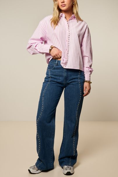 Jean large bleu foncé à clous ondulés