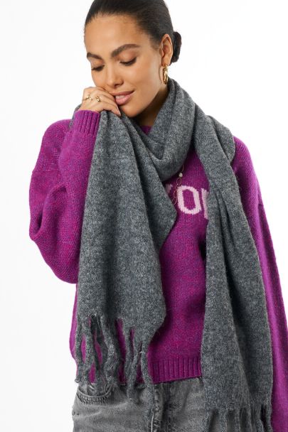 Dark grey knit scarf with fringe