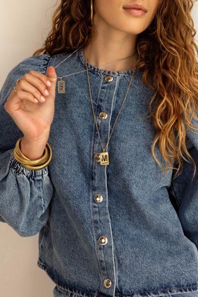 Blauwe denim top met ballon mouwen