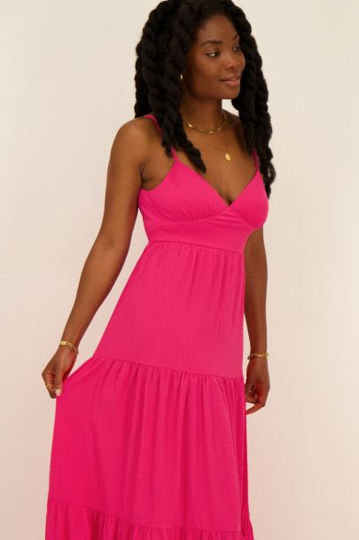 Robe longue fuschia avec nœud dans le dos