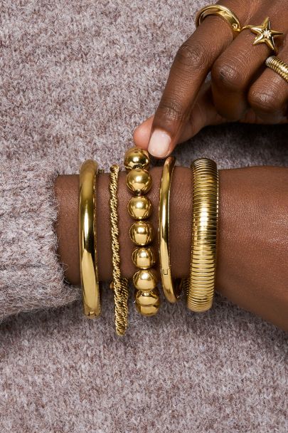 Bracelet extensible doré avec maxi perles fantaisie