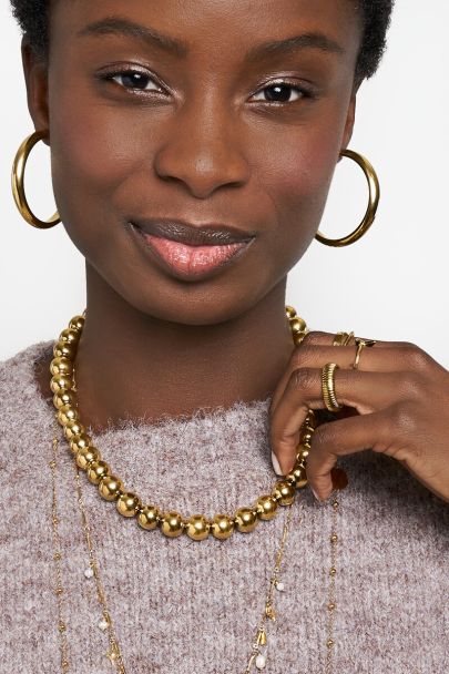 Gold-coloured statement necklace chunky beads