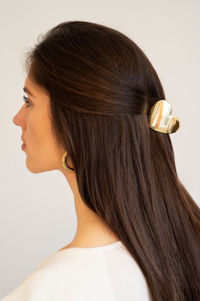 Pince à cheveux dorée en forme de cœur bombé