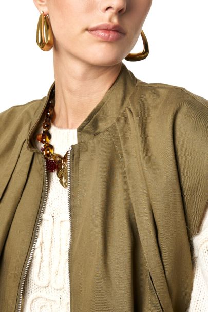 Groen gilet in ballon look