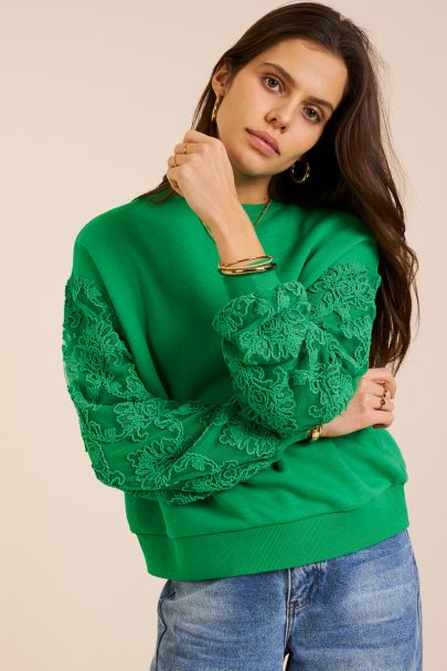 Groene sweater met fancy embroidery mouwen