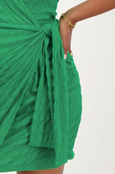 Groene jurk met overslag en structuur