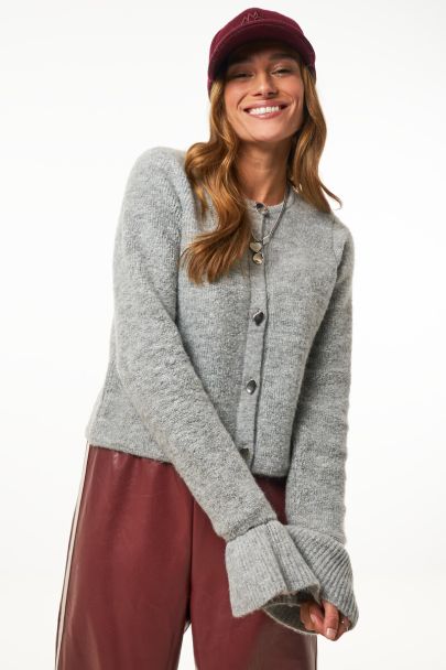 Grijs vest met flared mouwen en knopen