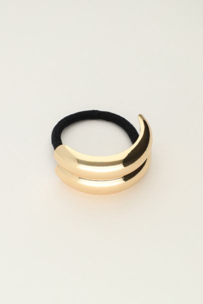 Hair tie with double gold coloured curve