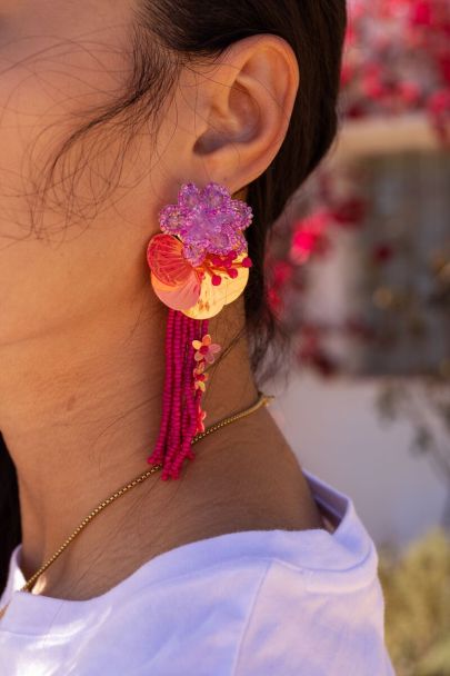 Island earrings with flowers and pink fringe