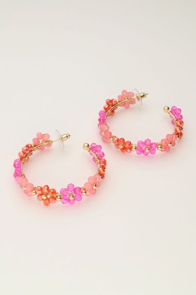 Large hoop earrings with pink flowers