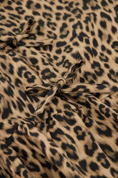 Top imprimé léopard avec noeuds et manches bouffantes