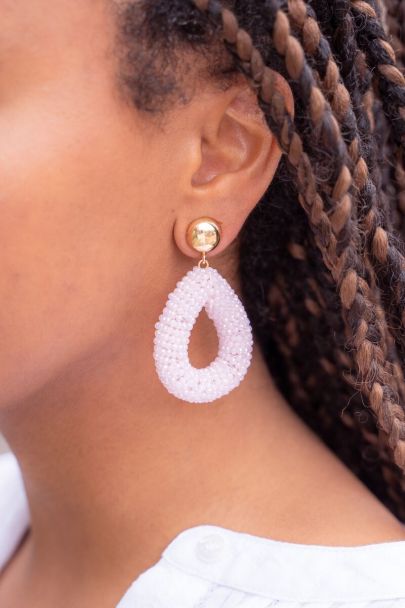 Light-pink statement earrings with rhinestones